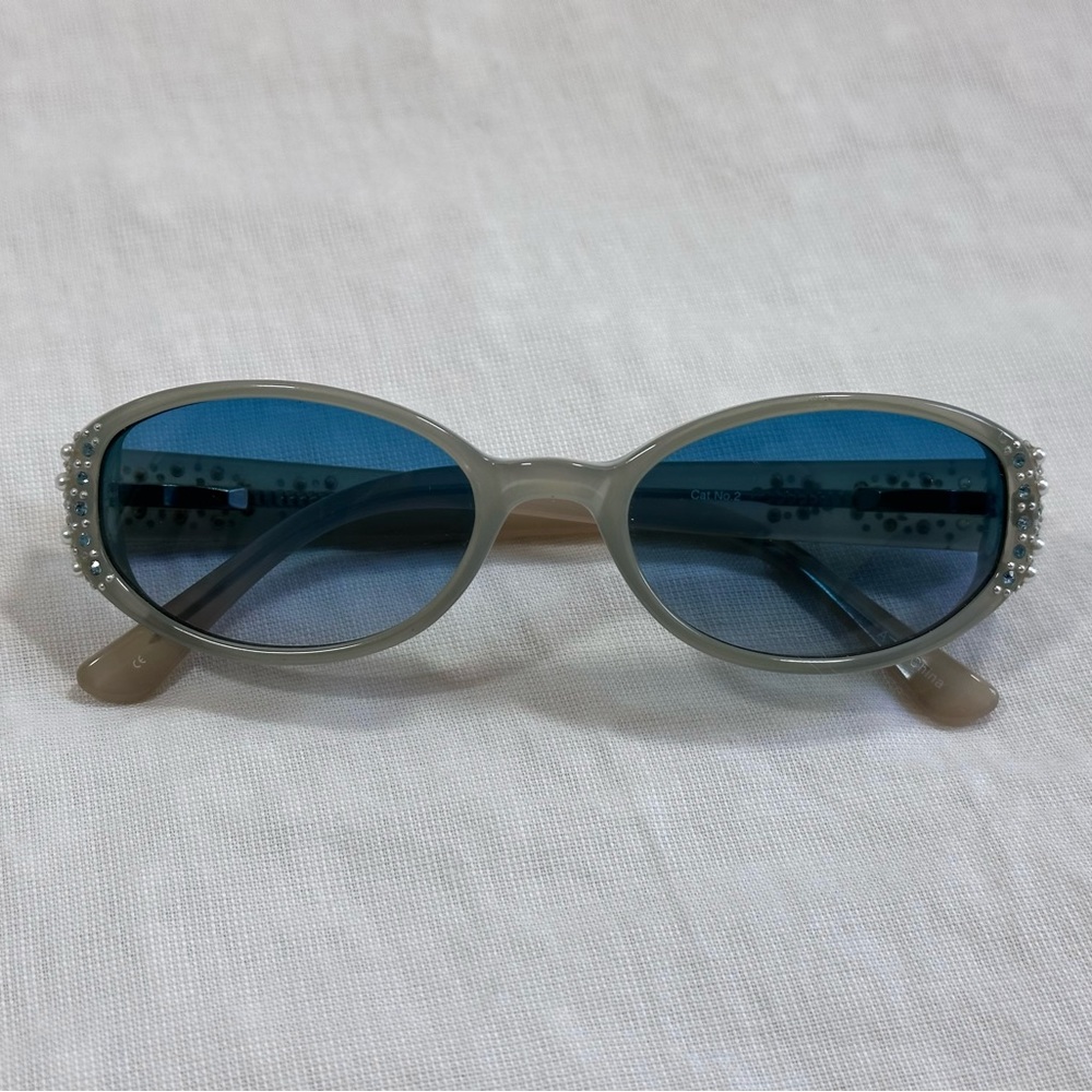 Blue lens fossil sunglasses with rhinestone stems